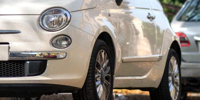 modern-cars-parked-on-city-street-side-in-resident-2023-11-27-05-21-10-utc (2)